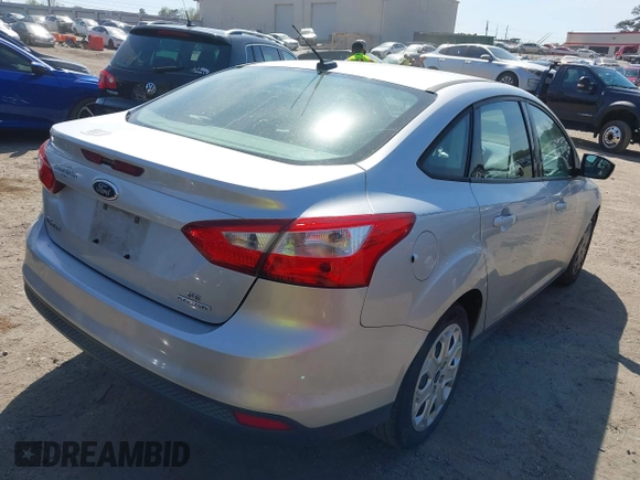 2012 Ford Focus SE with VIN 1FAHP3F29CL377721, listed as a IAAI auction lot 41848786 with 147,709 mi miles. Bid and sale history available at carsss.com. Image 4.
