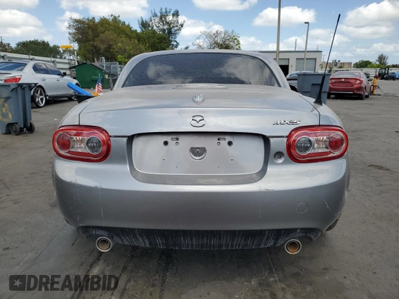 2015 Mazda MX-5 Miata Grand Touring z VIN JM1NC2PF0F0238698, wystawiony jako Copart lot #55455395 z przebiegiem Nie podano mil oraz Szkody całkowita. Historia ofert i sprzedaży dostępna na DreamBid. Obrazek 6.