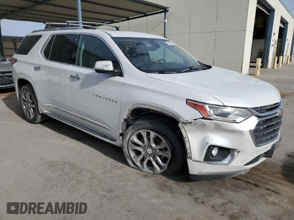 2019 Chevrolet Traverse Premier with VIN 1GNERKKW3KJ147054, listed as a Copart auction lot 59191225 with 112,436 mi miles and Salvage title. Bid and sale history available at DreamBid. Image 4.