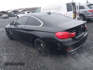 2015 BMW 4 Series 428i xDrive with VIN WBA3N5C56FK197981, listed as a IAAI auction lot 41145927 with 101,944 mi miles and . Bid and sale history available at DreamBid. Image 3.
