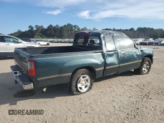 1995 Toyota T100 DX with VIN JT4VD12E1S0012010, listed as a Copart auction lot 83223154 with 253,492 mi miles and Salvage Title. Bid and sale history available at DreamBid. Image 3.