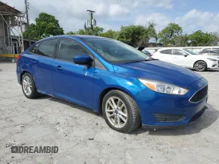 2018 Ford Focus SE with VIN 1FADP3F24JL205544, listed as a Copart auction lot 53555065 with 63,810 mi miles and Clean title. Bid and sale history available at DreamBid. Image 4.