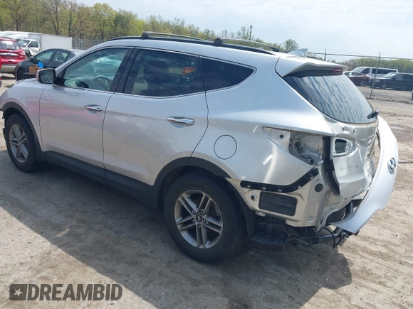 2017 Hyundai Santa Fe 2.4L z VIN 5XYZUDLB6HG400828, wystawiony jako IAAI lot #42013903 z przebiegiem 88 573 mil mil oraz . Historia ofert i sprzedaży dostępna na DreamBid. Obrazek 3.