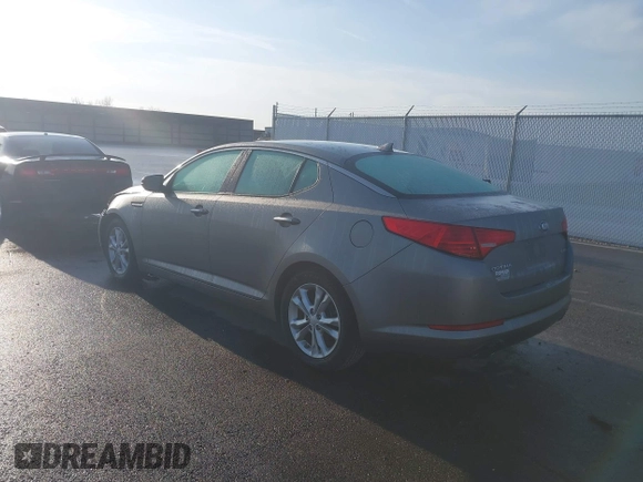 2013 Kia Optima EX with VIN 5XXGN4A77DG101902, listed as a IAAI auction lot 42001996 with 143,469 mi miles and . Bid and sale history available at DreamBid. Image 3.