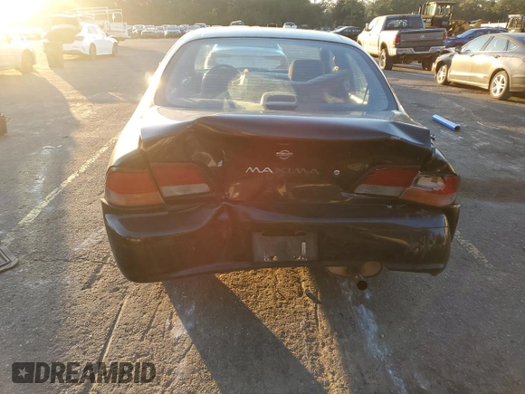 1998 Nissan Maxima GXE с VIN JN1CA21D6WT533634, выставлен на аукционе Copart как лот 83339404 с пробегом 180 356 миль миль и Списание • Salvage title. История ставок и продаж доступна на DreamBid. Изображение 6.