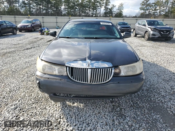 1999 Lincoln Town Car Executive z VIN 1LNHM81W4XY714116, wystawiony jako Copart lot #44424595 z przebiegiem 210 041 mil mil oraz Szkoda całkowita • Salvage title. Historia ofert i sprzedaży dostępna na DreamBid. Obrazek 5.