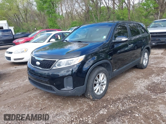 2014 Kia Sorento LX with VIN 5XYKTCA6XEG466573, listed as a IAAI auction lot 42092207 with 157,925 mi miles and . Bid and sale history available at carsss.com. Image 2.