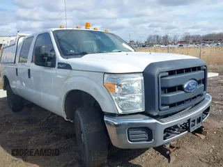 2015 Ford Super Duty F-250 SRW Lariat with VIN 1FT7W2B62FED04453, listed as a IAAI auction lot 41879422 with 313,725 mi miles. Bid and sale history available at carsss.com. Image 1.