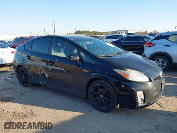 2011 Toyota Prius I with VIN JTDKN3DUXB0293692, listed as a IAAI auction lot 41628333 with 124,577 mi miles. Bid and sale history available at carsss.com. Image 1.