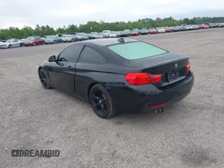 2015 BMW 4 Series 428i with VIN WBA3N3C55FK232319, listed as a IAAI auction lot 42136421 with 140,300 mi miles and . Bid and sale history available at DreamBid. Image 3.