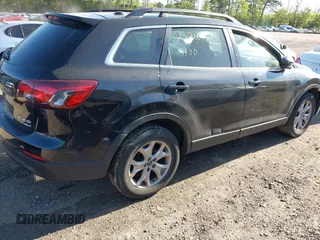 2014 Mazda CX-9 Touring with VIN JM3TB3CV4E0444786, listed as a IAAI auction lot 42249827 with Not provided miles and . Bid and sale history available at DreamBid. Image 4.