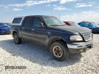 2001 Ford F-150 XLT with VIN 1FTRW08W41KF57904, listed as a Copart auction lot 47250035 with 185,985 mi miles and Clean title. Bid and sale history available at DreamBid. Image 4.