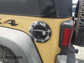 2013 Jeep Wrangler Sport with VIN 1C4AJWAG1DL672816, listed as a IAAI auction lot 42597238 with 105,910 mi miles and . Bid and sale history available at DreamBid. Image 6.