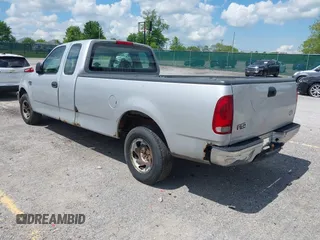 1998 Ford F-150 with VIN 1FTZX1767WNB79135, listed as a IAAI auction lot 42251761 with 221,839 mi miles and . Bid and sale history available at DreamBid. Image 3.