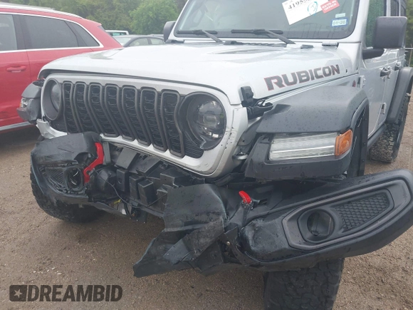 2024 Jeep Wrangler Rubicon with VIN 1C4PJXFG7RW252959, listed as a IAAI auction lot 41955302 with 27,727 mi miles and . Bid and sale history available at DreamBid. Image 6.