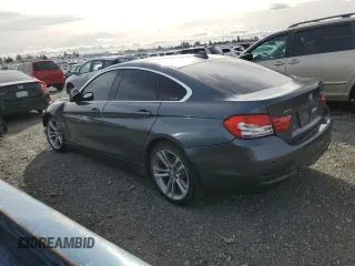 2017 BMW 4 Series 430i xDrive with VIN WBA4F9C54HG440590, listed as a Copart auction lot 45761255 with 105,551 mi miles and Salvage title. Bid and sale history available at DreamBid. Image 2.