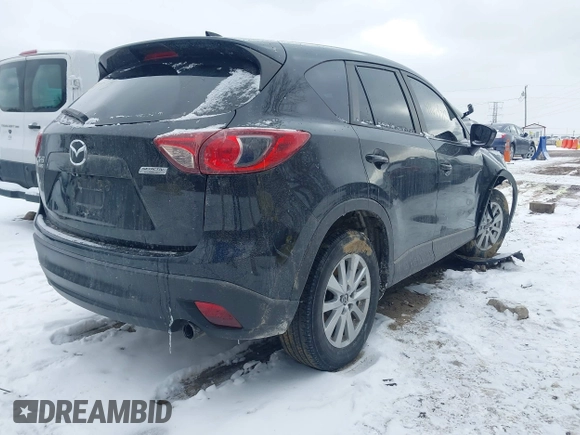 2014 Mazda CX-5 Touring with VIN JM3KE4CY8E0416590, listed as a IAAI auction lot 41619713 with 225,156 mi miles. Bid and sale history available at carsss.com. Image 4.