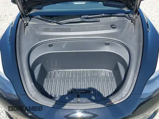 2022 Tesla Model 3 Long Range with VIN 5YJ3E1EB7NF241996, listed as a IAAI auction lot 42115915 with 23,433 mi miles and . Bid and sale history available at DreamBid. Image 10.