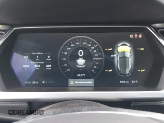 2014 Tesla Model S 60 with VIN 5YJSA1H1XEFP36008, listed as a IAAI auction lot 41287240 with 48,171 mi miles and . Bid and sale history available at DreamBid. Image 7.
