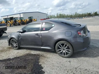2016 Scion tC z VIN JTKJF5C78GJ019806, wystawiony jako Copart lot #51933685 z przebiegiem 152 395 mil mil oraz Szkody całkowita. Historia ofert i sprzedaży dostępna na DreamBid. Obrazek 2.