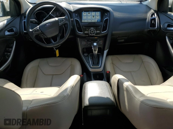 2017 Ford Focus Titanium with VIN 1FADP3N21HL279810, listed as a Copart auction lot 57950195 with 121,139 mi miles and Salvage title. Bid and sale history available at DreamBid. Image 8.