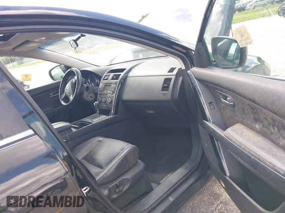 2012 Mazda CX-9 Touring with VIN JM3TB3CV1C0338681, listed as a IAAI auction lot 40458498 with 128,665 mi miles and . Bid and sale history available at DreamBid. Image 5.