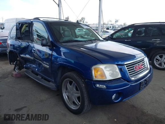 2006 GMC Envoy SLE with VIN 1GKDS13S562252049, listed as a IAAI auction lot 41940052 with 149,445 mi miles. Bid and sale history available at carsss.com. Image 1.