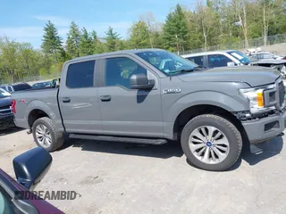 2018 Ford F-150 XL with VIN 1FTEW1EP6JFE00496, listed as a IAAI auction lot 42247235 with 76,858 mi miles and . Bid and sale history available at DreamBid. Image 14.