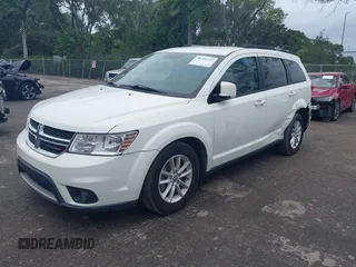 2017 Dodge Journey SXT with VIN 3C4PDDBG3HT592061, listed as a IAAI auction lot 38299155 with 127,856 mi miles and . Bid and sale history available at DreamBid. Image 2.