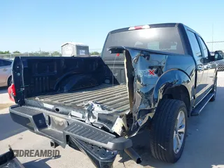 2018 Ford F-150 XL with VIN 1FTEW1C58JKC02382, listed as a IAAI auction lot 42010568 with 124,757 mi miles and . Bid and sale history available at DreamBid. Image 6.