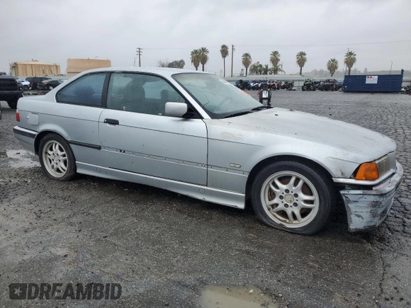 1998 BMW 3 Series 328is with VIN WBABG132XWET07045, listed as a Copart auction lot 49470225 with 186,922 mi miles and Clean Title. Bid and sale history available at carsss.com. Image 4.