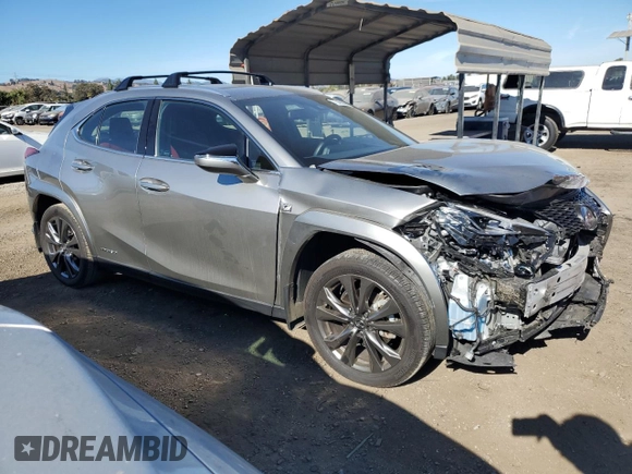 2022 Lexus UX 250h F Sport with VIN JTHE9JBH2N2062143, listed as a Copart auction lot 77345634 with 13,118 mi miles and Salvage Title. Bid and sale history available at DreamBid. Image 4.