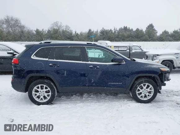2014 Jeep Cherokee Altitude with VIN 1C4PJMCB9EW187288, listed as a IAAI auction lot 41320161 with 169,534 mi miles and . Bid and sale history available at DreamBid. Image 14.