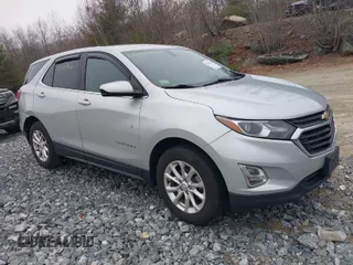 2018 Chevrolet Equinox LT z VIN 2GNAXSEV2J6279564, wystawiony jako IAAI lot #41911866 z przebiegiem 151 834 mil mil oraz . Historia ofert i sprzedaży dostępna na DreamBid. Obrazek 1.