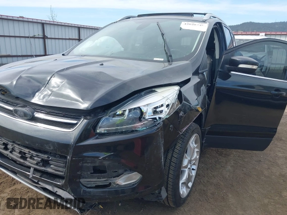 2014 Ford Escape Titanium with VIN 1FMCU9J93EUE27803, listed as a IAAI auction lot 42028249 with 131,194 mi miles and . Bid and sale history available at DreamBid. Image 6.