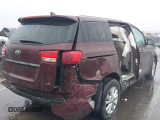 2016 Kia Sedona LX with VIN KNDMB5C17G6144987, listed as a IAAI auction lot 41569757 with 164,539 mi miles. Bid and sale history available at carsss.com. Image 4.