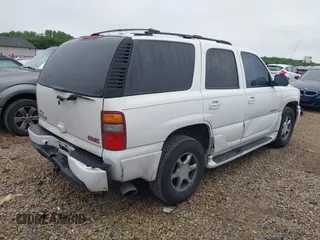 2002 GMC Yukon Denali z VIN 1GKEK63U62J248966, wystawiony jako IAAI lot #42366016 z przebiegiem 190 804 mil mil oraz . Historia ofert i sprzedaży dostępna na DreamBid. Obrazek 4.