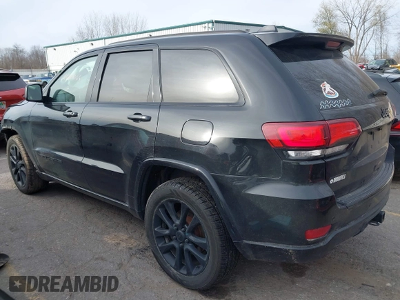2017 Jeep Grand Cherokee Laredo with VIN 1C4RJFAG7HC873211, listed as a IAAI auction lot 40849066 with 139,430 mi miles. Bid and sale history available at carsss.com. Image 3.