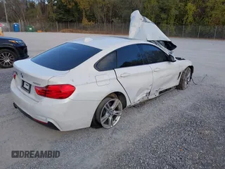 2015 BMW 4 Series 428i xDrive z VIN WBA4C9C57FD330866, wystawiony jako IAAI lot #40574326 z przebiegiem 123 726 mil mil oraz . Historia ofert i sprzedaży dostępna na DreamBid. Obrazek 4.