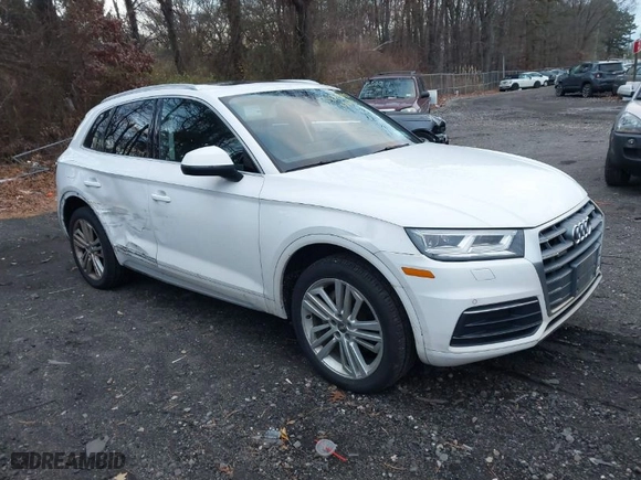 2018 Audi Q5 Premium Plus with VIN WA1BNAFY0J2082857, listed as a IAAI auction lot 40997190 with 138997 miles. Bid and sale history available at carsss.com. Image 1.