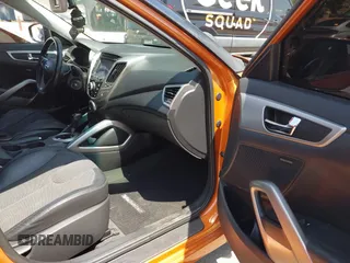 2012 Hyundai Veloster w/Gray Int with VIN KMHTC6ADXCU037879, listed as a IAAI auction lot 42093850 with 189,991 mi miles and . Bid and sale history available at DreamBid. Image 5.