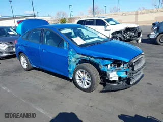 2017 Ford Focus SE with VIN 1FADP3F21HL246837, listed as a IAAI auction lot 41696492 with 84,124 mi miles. Bid and sale history available at carsss.com. Image 1.