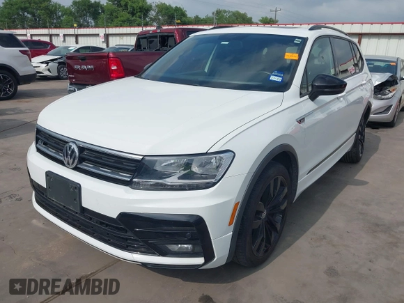 2021 Volkswagen Tiguan SE with VIN 3VV3B7AX9MM003432, listed as a IAAI auction lot 41914477 with 64,530 mi miles and . Bid and sale history available at DreamBid. Image 18.