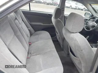 2004 Toyota Camry LE z VIN 4T1BE32K24U939042, wystawiony jako IAAI lot #42324099 z przebiegiem 151 784 mil mil oraz . Historia ofert i sprzedaży dostępna na DreamBid. Obrazek 8.
