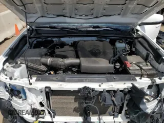 2022 Toyota Tacoma SR с VIN 3TMCZ5AN7NM454051, выставлен на аукционе Copart как лот 59896115 с пробегом 70 202 миль миль и Списание • Salvage title. История ставок и продаж доступна на DreamBid. Изображение 11.