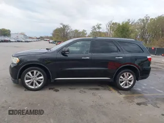 2013 Dodge Durango Crew with VIN 1C4RDHDG8DC592706, listed as a IAAI auction lot 40745114 with 95,757 mi miles and . Bid and sale history available at DreamBid. Image 14.
