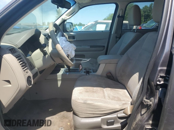 2011 Ford Escape XLT z VIN 1FMCU9DG7BKC39271, wystawiony jako Copart lot #55880445 z przebiegiem 202 072 mil mil oraz Szkoda całkowita • Salvage title. Historia ofert i sprzedaży dostępna na DreamBid. Obrazek 7.