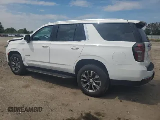2023 Chevrolet Tahoe LS with VIN 1GNSKMKD7PR202230, listed as a Copart auction lot 56620975 with 27,007 mi miles and Salvage title. Bid and sale history available at DreamBid. Image 2.