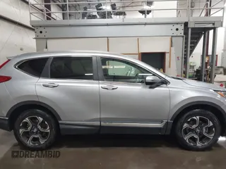 2017 Honda CR-V Touring with VIN 2HKRW2H90HH603307, listed as a IAAI auction lot 41868564 with 81,144 mi miles. Bid and sale history available at carsss.com. Image 13.