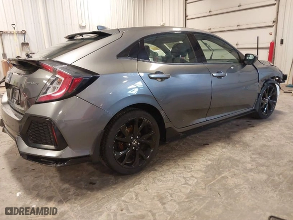2018 Honda Civic Hatchback Sport with VIN SHHFK7H46JU229577, listed as a IAAI auction lot 41306263 with 76,408 mi miles. Bid and sale history available at carsss.com. Image 4.